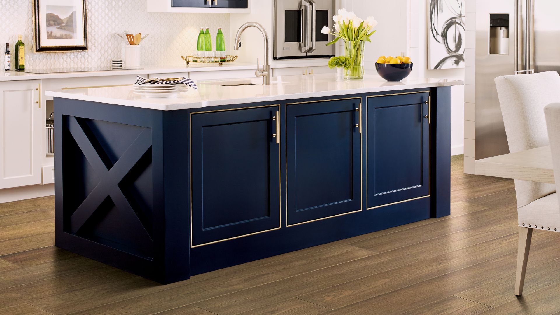 hardwood flooring in a modern kitchen with blue island 